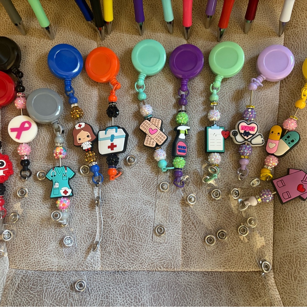 Badge reels and pens! All beaded and can be made to order!
